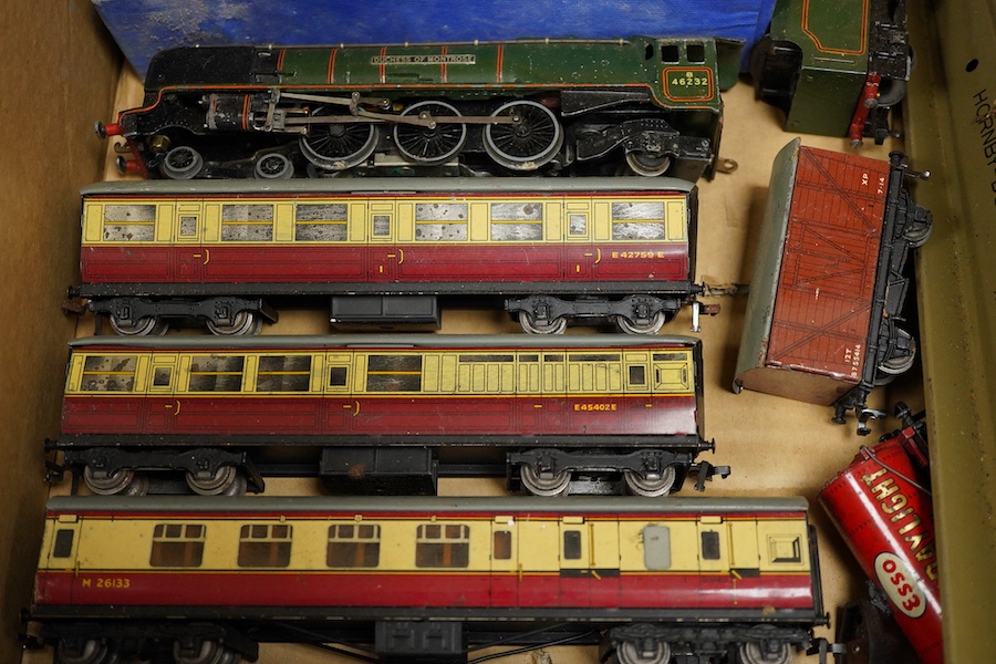 A collection of Hornby Dublo for 3-rail running, including two locomotives; a BR Duchess of Montrose, and a BR Standard Class 4MT 2-6-4T, together with four carmine and cream bogie coaches, nine freight wagons, a signal